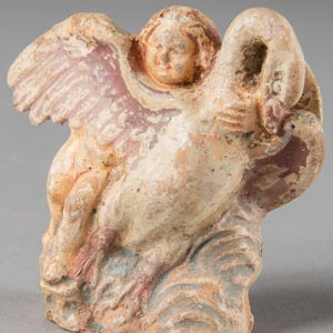 Eros and a swan figurine
