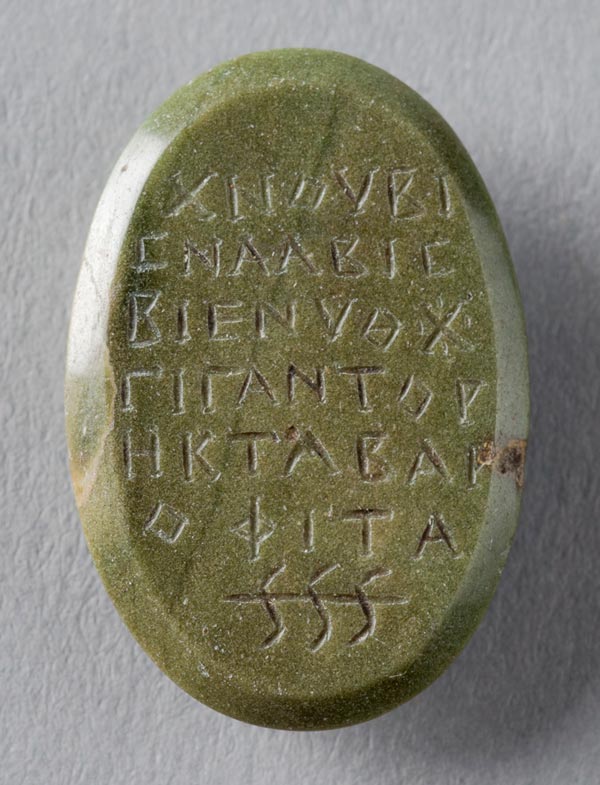 Stomach amulet verso