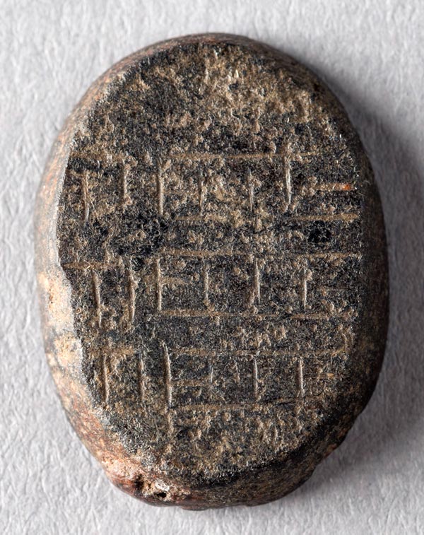 Stomach amulet verso