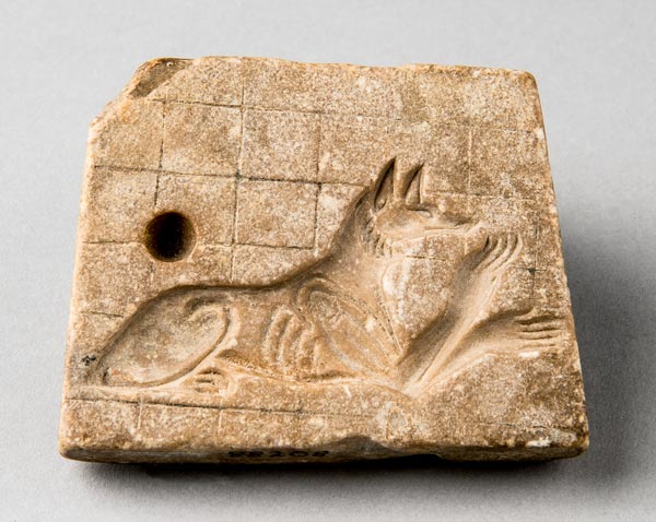 Mold of jackal with human arms