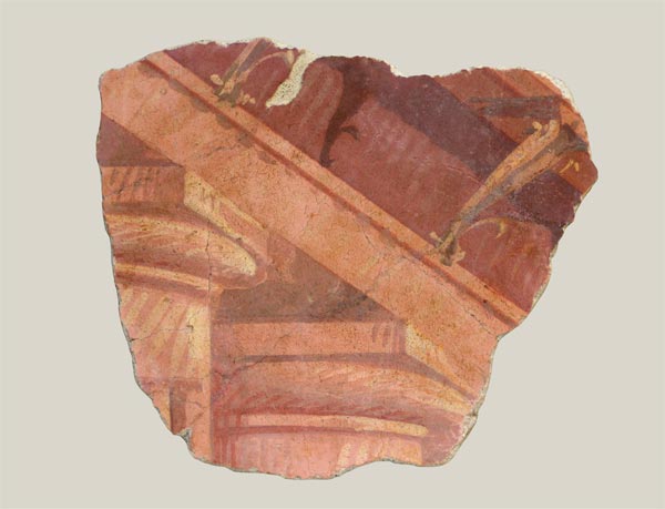 Two doric capitals and partial entablature from lower order