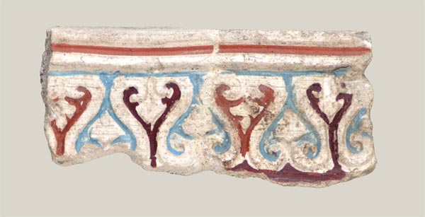 Stucco fragments with s-shaped volutes and trefoils