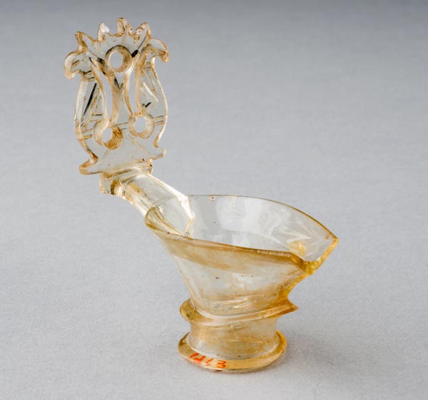 Pouring spout and ornate thumb rest